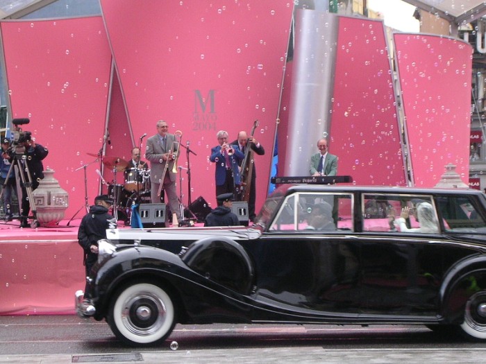 Canal Street with the Royal Rolls & the Royal couple waving at the band.  May, 2004.